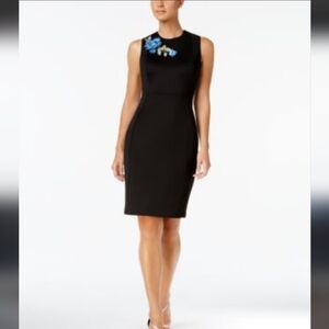 Elegant Black Dress with Blue Floral Accents